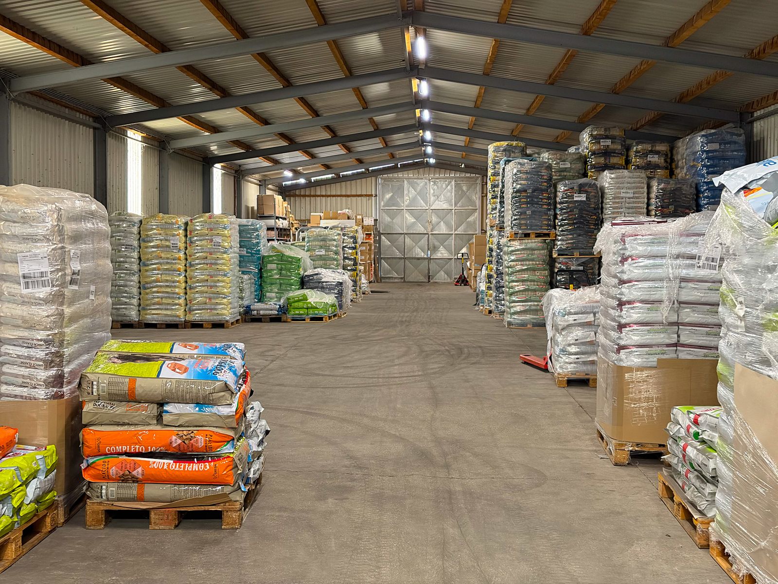 Pet food on pallets in the main warehouse aisle